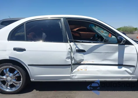 2001 Honda Civic Dx z USA, uszkodzony, nr VIN 1HGES152X1L063818